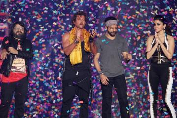 Fans wait for the real action after star studded opening ceremony