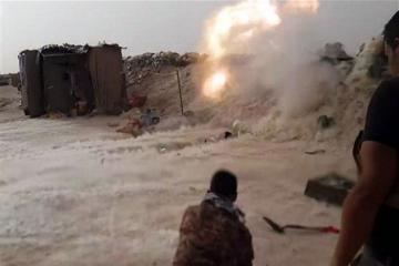 41 killed in ISIS suicide attacks at police base in western Iraq