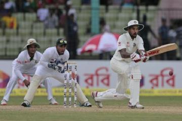 Dhawan lights up an overcast day