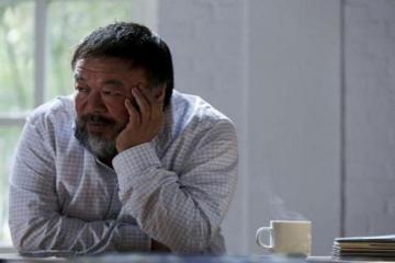 China returns dissident artist Ai Weiwei's passport