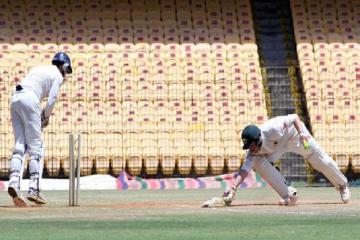 Sandhu�s late strikes check India�A�