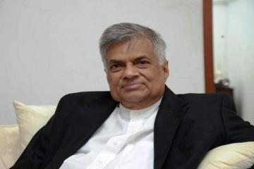 Ranil hopeful of political solution to Tamil question