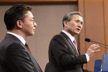 Koreas agree to defuse crisis