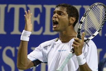 Ramkumar surges into the last eight