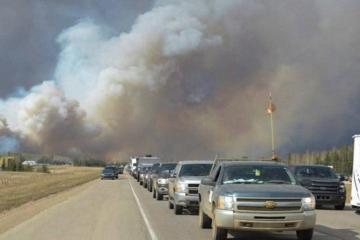 Alberta declares emergency as fires threaten Canada oil town